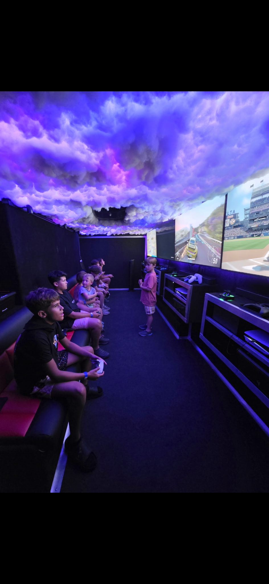 Guests playing video games inside the Big Jay's Gaming truck